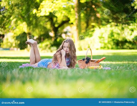 Beautiful Girl Having A Picnic Stock Image Image Of Jeans Apple 34553855