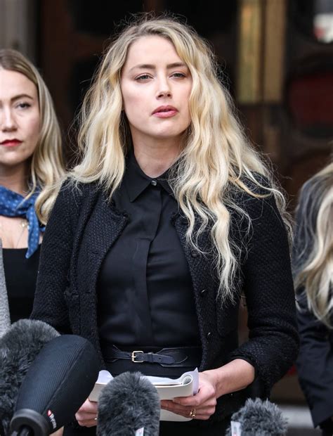 Amber Heard Pictured While Giving A Statement Outside The Royal