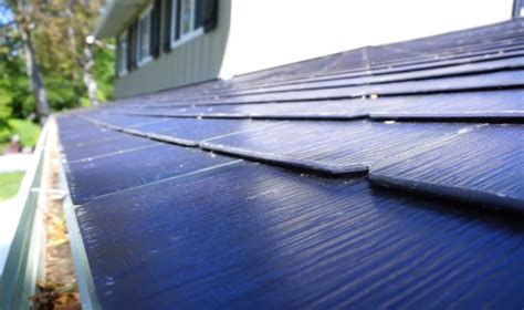 How do tesla solar shingles stack up against standard solar panels? Tesla Solar Roof owner discusses installation price ...