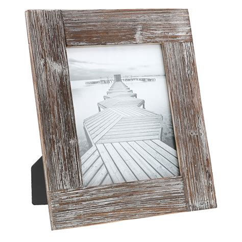 The picture frames can be moved around the metal ledge and rotated to a landscape or portrait orientation. Barnyard Designs Rustic Farmhouse Distressed Picture Frame ...
