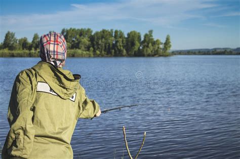 Fishing on the River Bank 3 Stock Image - Image of sport, person: 96751895