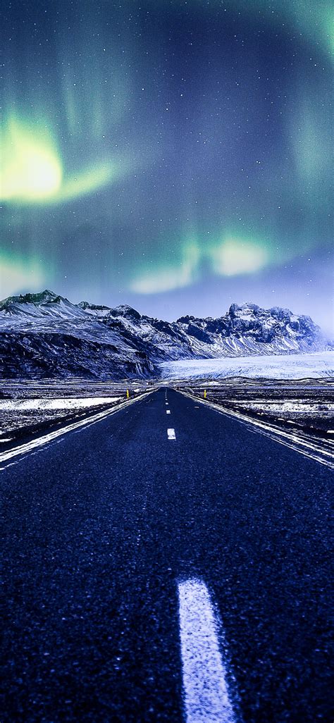 Download Wallpaper 1125x2436 Aurora Borealis Northern Lights Highway
