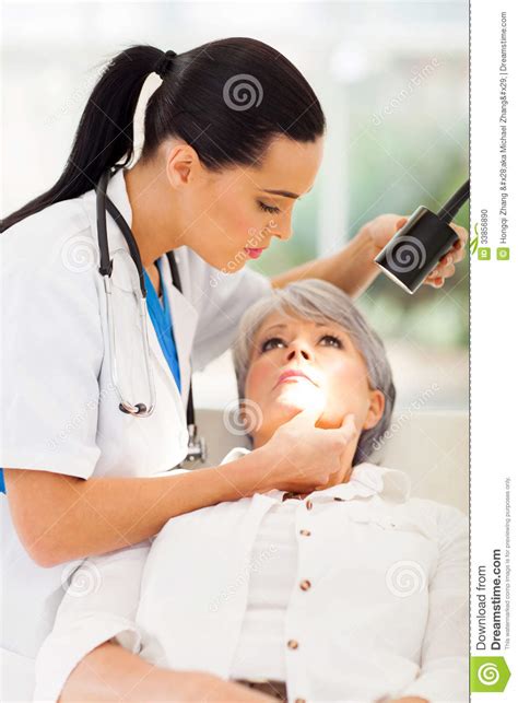 Online visits take only a few minutes. Dermatologist patient skin stock photo. Image of examining ...