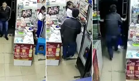 Moment Man Attempts To Snatch Schoolgirl From Shop Caught On Camera Extraie