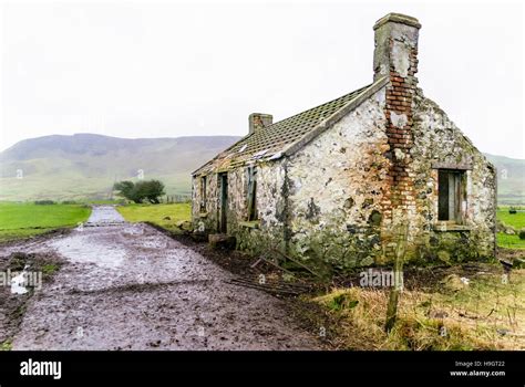 An Old Abandoned Irish Farmhouse At The Foot Of Sallagh Brae County