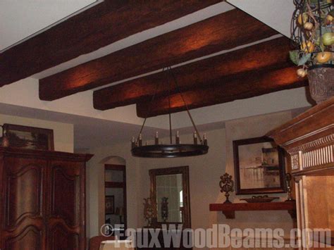 Probably better to just stagger it as if it was flooring. Faux beam Tray ceiling update - Traditional - Family Room ...