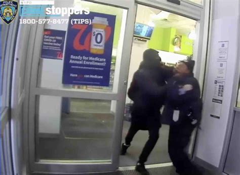 Video Thug Takes Swing At Cops Face Knocks Her Flat On Her Back Amid Suspected Shoplifting