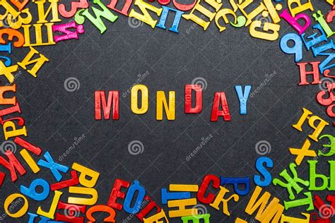 Monday Word Made Of Bright Colored Letters On Black Background Stock