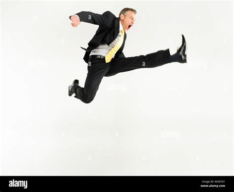Business Man Jumping Full Length Stock Photo Alamy