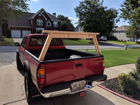 Finally, a ladder rack that installs over your truck cap without drilling! DIY ladder rack? | Diy ladder, Kayak rack for truck, Kayak ...