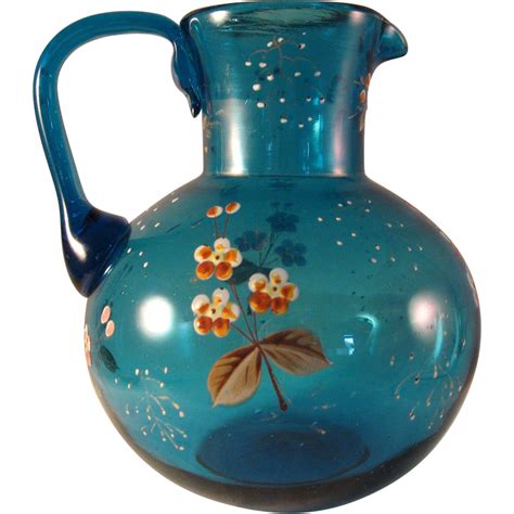 Vintage Aqua Blue Pitcher With Applied Handle And Small Flower Blossoms