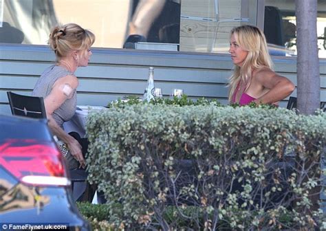 Melanie Griffith Puffs On A Cigarillo Over Lunch In Beverly Hills