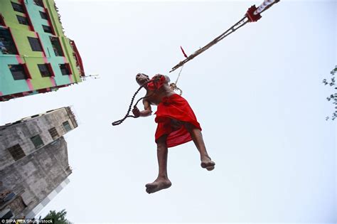 Men In Bangladesh Hang Themselves From Hooks In Charak Puja Festival