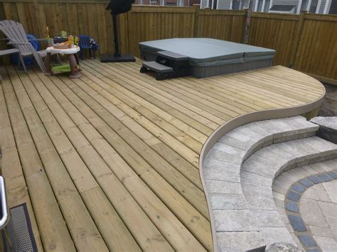 Pressure Treated Deck With Curves Pvc Trim And Stone Steps Wood Bench