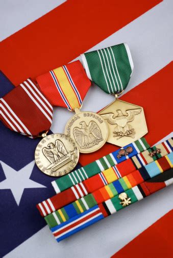 Us Army Ribbons And Medals On Flag Background Stock Photo