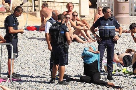 Humiliated Muslim Woman Forced To Remove Burkini On Nice Beach In