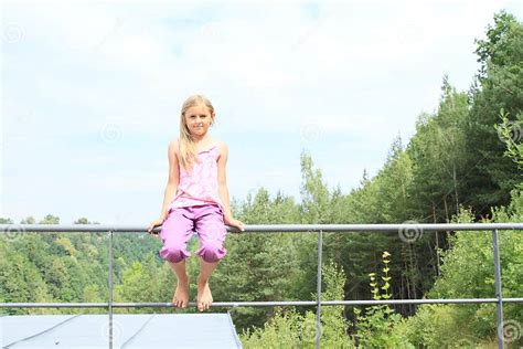 Girl Sitting On Railings Stock Image Image Of Green 42478001