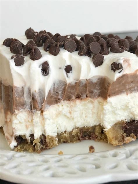 A large dutch profiterole, filled with whipped cream and coated entirely with chocolate. Chocolate Chip Cookie Layered Pudding Dessert - Together as Family