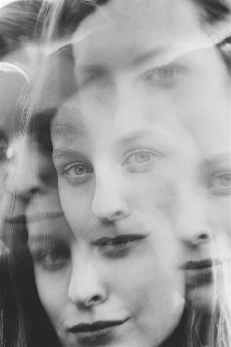 Black And White Portrait Of Young Woman Looking At Camera Del Colaborador De Stocksy Michela