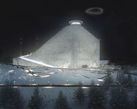 An Artistic Building Is Lit Up At Night With Lights Shining On The Roof And Surrounding It