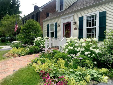 Shrubs for ranch houses should be round, oval or free form. Entrances - Nature's Perspective Landscaping