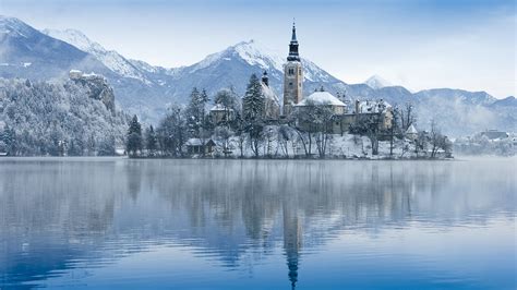 View Of Church On Island On Lake Bled In Winter Slovenia
