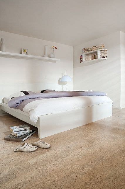 Cork flooring is in its prime, even being cork flooring is saving the planet, which is a huge deal in the flooring industry. Cork flooring looks great in this simplistic bedroom ...