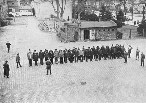 Prisoners Guarded By Sa Men Line Up In The Yard Of The Oranienburg