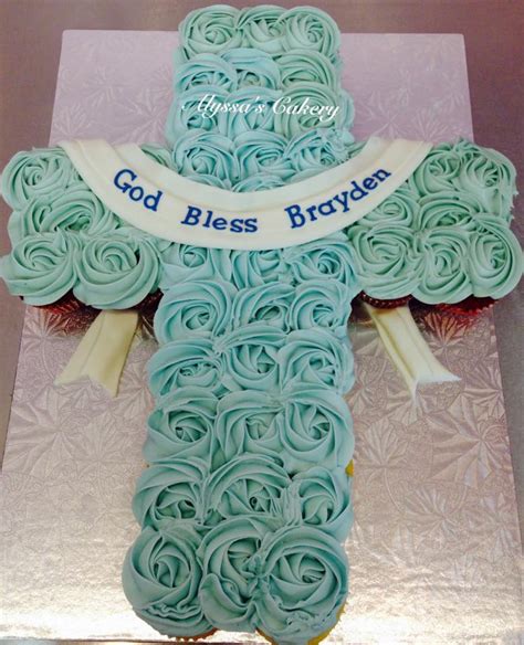 blue rosette cupcake cross alyssas cakery