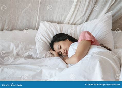 Closeup Asian Woman Sleep On Bed Under Blanket In Bedroom Background In