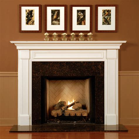 A white fireplace can add a timeless and gorgeous touch to any room. Wood Fireplace Mantel Surround | Lewisburg