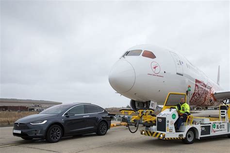 Watch A Tesla Model X Tow A Passenger Plane Carbuzz