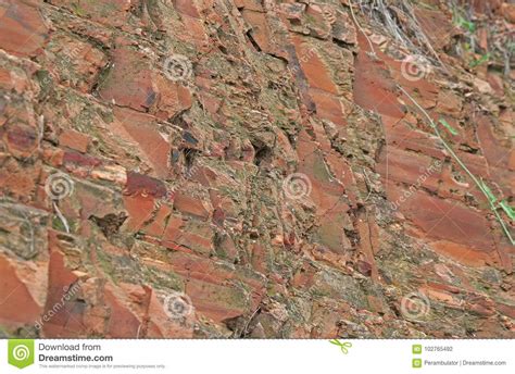 Green Moss On Red Layers Of Rock Stock Photo Image Of
