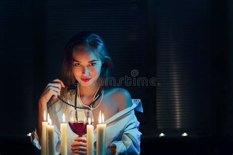 Woman With Candles Stock Photo Image Of Dark Interior 82493990