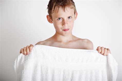 Boy hiding behind towel stock image. Image of chest, hygiene - 11985551
