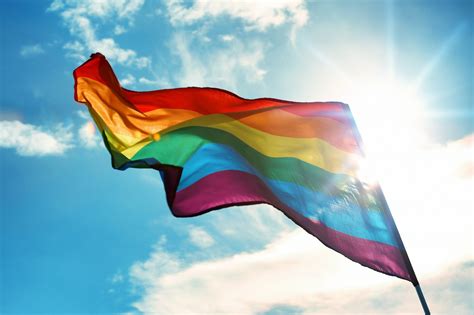 The History Of The Lgbtq Pride Flag From The Og Rainbow To Progress Pride