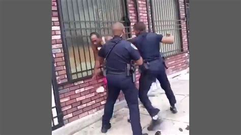 Baltimore Police Officer Suspended With Pay After Viral Video Shows Him Punching Tackling Man