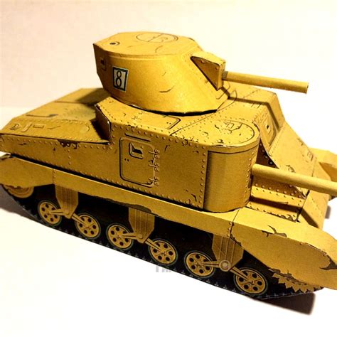 A Yellow Toy Tank Sitting On Top Of A White Table