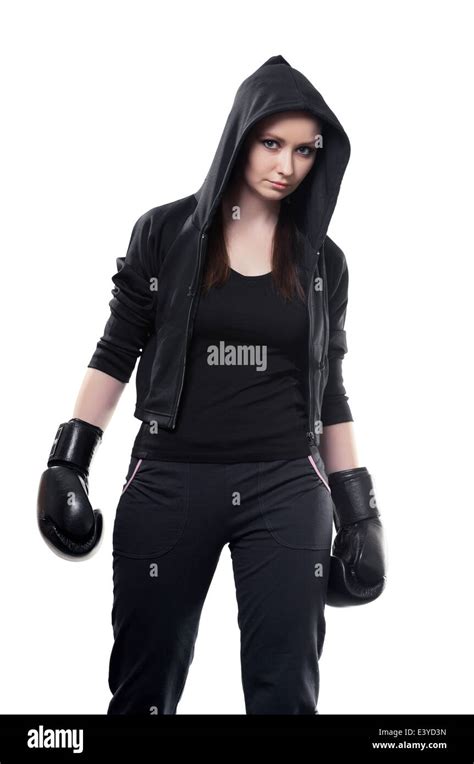 Young Serious Woman In Boxing Gloves On A White Background Stock Photo