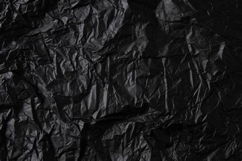 Premium Photo Crumpled Black Paper Texture