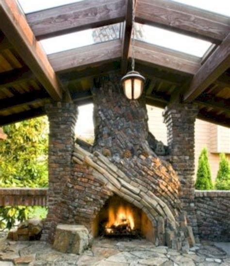 Well in this article, i intend to show how to do it without incurring a high cost of hiring a masonry contractor and instead opting for a prefabricated fireplace. 52 Stunning Outdoor Stone Fireplaces Design Ideas ...