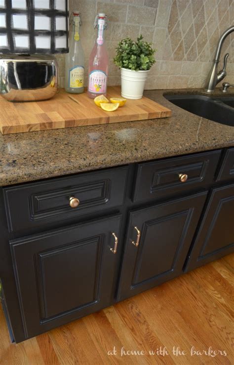It's not for the faint of heart, certainly, but we have to say that we love the look of black cabinets in the kitchen. How to Paint Kitchen Cabinets- At Home with The Barkers