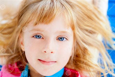 beautiful blond blue eyes girl lying stock image image of lifestyle leisure 21477835