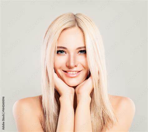 cute blonde woman fashion model with blonde hair smiling beautiful girl pretty face stock 写真