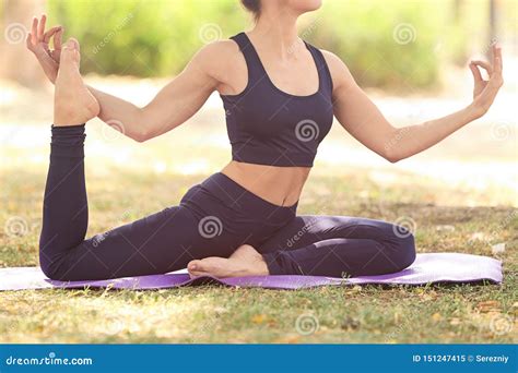 Young Woman Practicing Yoga Outdoors Stock Image Image Of