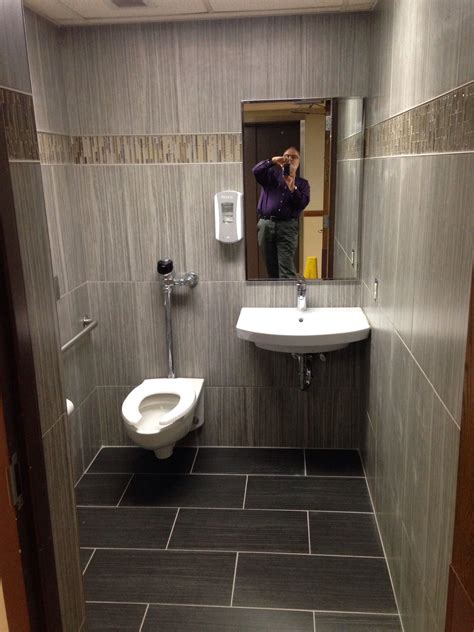 Even if the room is carpeted, a soft thick space rug will accent the decor, add colour and interest to the room and provide another. Public Restroom Retile/Remodel after picture . | Restroom ...