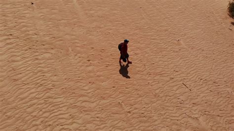 Aerial Video Of People Walking In The Desert 4k Stock Footage Video