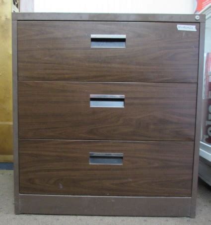 Pick a compact filing cabinet of one or two drawers for small amounts of filing, or go right up to 12 drawers or even more for some heavy duty storage. Lot Detail - HEAVY DUTY METAL FILING CABINET WITH FAUX ...