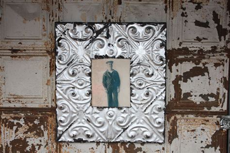 Restoring antique ceiling tins adds beauty to an old home. salvaged ceiling tin picture frame for an 8x10 photo by ...