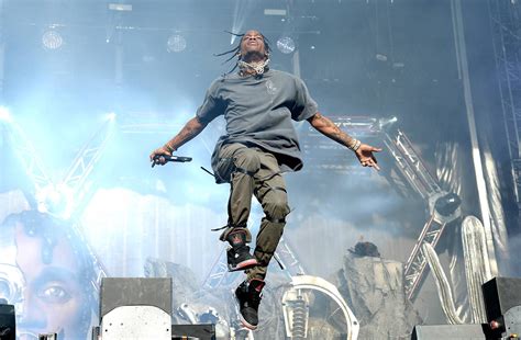 Travis Scott Says His Fall Through Drakes Stage Wasnt What It Looked